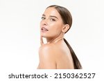 Beauty shot of charming Caucasian female with long dark hair and bare shoulders on white isolated background