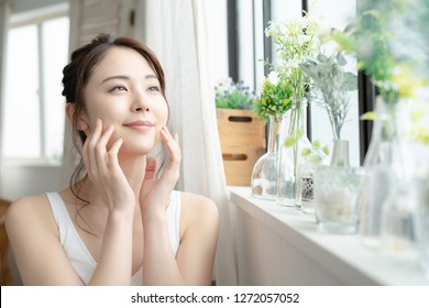 Beauty And Skin Care Concept Of A Young Asian Woman.