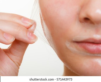 Beauty Skin Care Cosmetics And Health Concept. Young Woman Part Of Face, Girl Removing Facial Peel Off Mask. Peeling.