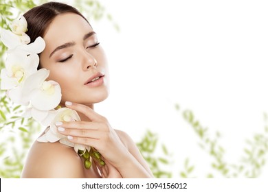 Beauty Skin Care And Face Makeup, Woman Skincare Natural Make Up, Beautiful Model And Orchid Flower, Eyes Closed
