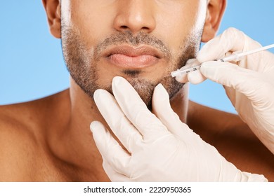 Beauty, Skincare And Face Of Man With Botox Injection On Blue Studio Background. Healthcare, Medical And Male Model With Aesthetic Plastic Surgery Treatment, Dermatology Or Facial Anti Aging Filler.