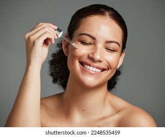 Beauty, skincare and serum with face of woman for facial, product or self care with morning routine. Luxury, health and wellness with girl model and cosmetics for collagen, vitamin c or essential oil - Powered by Shutterstock