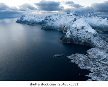 The Beauty of SnowCapped Mountains Paired with a Serene and Picturesque Waterscape - Powered by Shutterstock