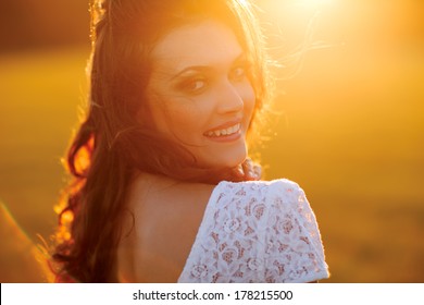 Beauty Sunshine Girl Portrait. Happy Woman Smiling.