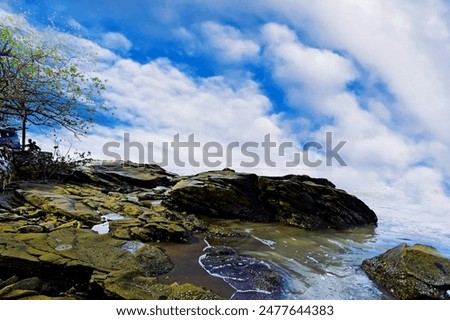 Similar – Foto Bild Strand mit Felsen und Pfütze im Sonnenuntergang, Ribadeo, Lugo, Galizien, Spanien