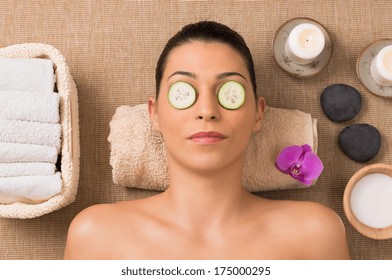 Beauty Treatment With Cucumber Slices On Eyes