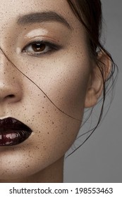 Beauty Vogue Style Fashion Chinese Model Girl with Dark lips. Fashion Trendy Make-up