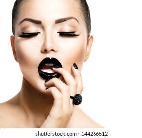 Beauty Vogue Style Fashion Model Girl with Long Lushes, Black Manicure and Lipstick.  Fashion Trendy Caviar Black Manicure. Nail Art. Passion
