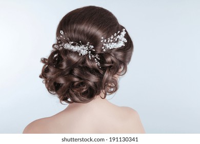 Beauty Wedding Hairstyle. Bride. Brunette Girl With Curly Hair Styling With Barrette. 