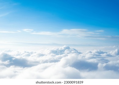 Beauty white cloudy on blue sky with soft sun light, Nature view soft white clouds on pastel blue sky background
