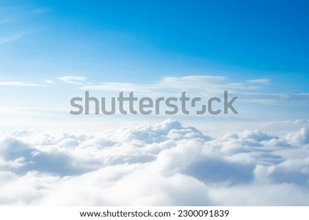 Beauty white cloudy on blue sky with soft sun light, Nature view soft white clouds on pastel blue sky background