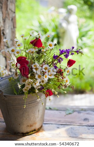 beauty wild flowers in basket