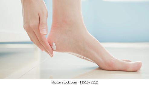 Beauty Woman Apply Cream With Foot At Home