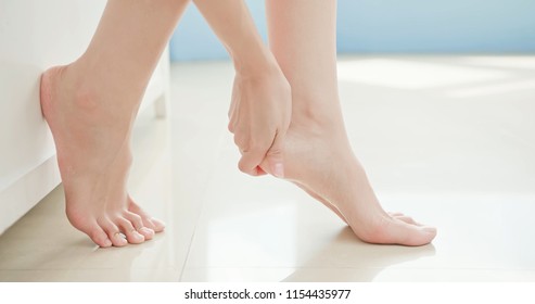 Beauty Woman Apply Cream With Foot At Home