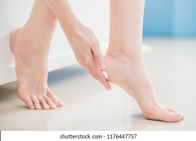 Beauty Woman Apply Cream With Foot At Home