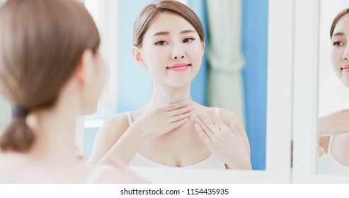 Beauty Woman Apply Cream With Neck At Home