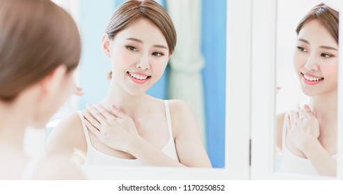 Beauty Woman Apply Cream With Neck And Chest At Home