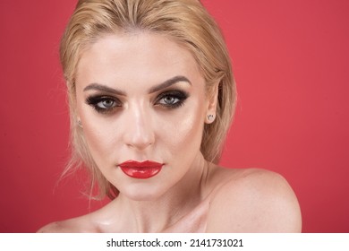 Beauty woman with blue eyes and red lips. Fashion girl face. Vogue spring summer style. Clean skin and bright makeup. Sexy woman lips with red lipstick. Visage and cosmetic advertising.