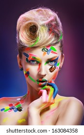 Beauty Woman With Creative Make Up Different Colors And Crystals