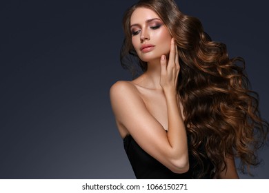 Beauty Woman face Portrait. Beautiful Spa model Girl with Perfect Long Hair and Fresh Clean Skin. - Shutterstock ID 1066150271