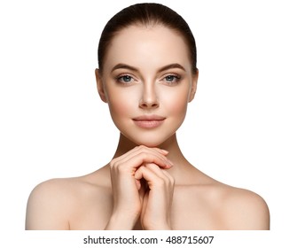 Beauty Woman face Portrait. Beautiful Spa model Girl with Perfect Fresh Clean Skin. Brunette female looking at camera and smiling. Youth and Skin Care Concept