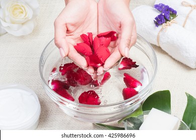 beauty woman hands with a bowl of aroma spa water on a table,Spa relaxation,Spa treatment.