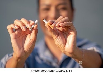 Beauty Woman Happy To Breaking A Cigarette. International Wold Tobacco Day And  Quit Smoking Cigarettes Concept.