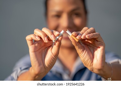 Beauty Woman Happy To Breaking A Cigarette. International Wold Tobacco Day And  Quit Smoking Cigarettes Concept.