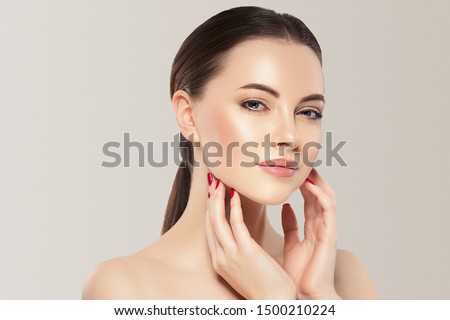 Beauty woman healthy skin concept natural makeup beautiful model girl face hands touching woth manicure nails