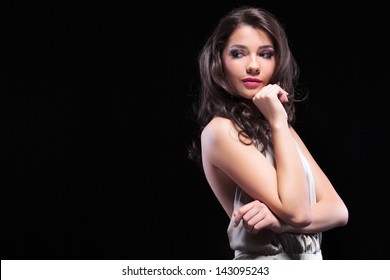 beauty woman looks over her shoulder deviously