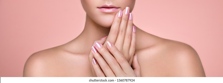 Beauty Woman with perfect Makeup and Manicure. Glamour Girl. Pink Lips and Nails. Skin care foundation. Beauty girls Face isolated on light Background. Fashion photo