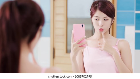 beauty woman selfie happily in the bathroom - Powered by Shutterstock