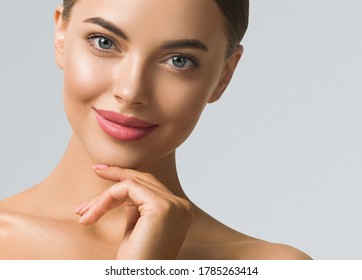 Beauty woman skin care beautiful female hand touching face cosmetic girl model over blue background - Shutterstock ID 1785263414