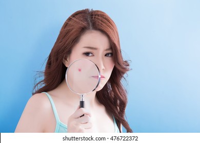 Beauty Woman Take Magnifying Looking At Her Acne Upset With Blue Background, Asian