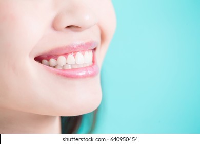 beauty woman with tooth whiten concept on green background - Shutterstock ID 640950454