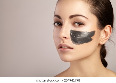 Beauty women getting facial mask