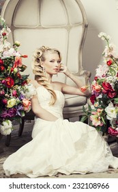 Beauty Young Bride Alone In Luxury Vintage Interior With A Lot Of Flowers