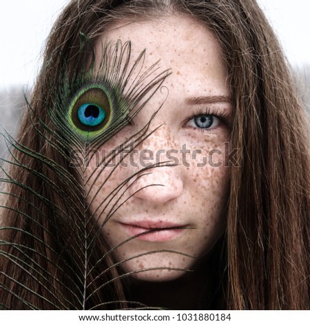 Similar – Image, Stock Photo a girl looking at the camera face down