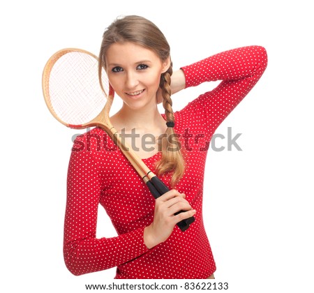 beauty young woman with wooden badminton rackets
