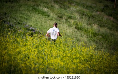 Beaver Creek, Colorado, USA - July 17, 2016: A Runner Moves Among The Summer Vegetation At The XTERRA Beaver Creek Trail Run.