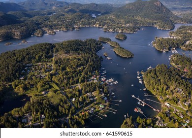 Beaver Island In Sunshine Coast, British Columbia, Canada, During A Cloudy Evening From An Aerial View.