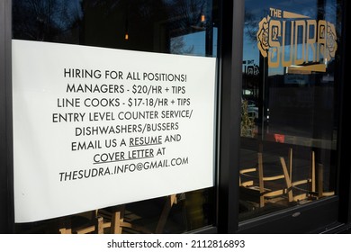 Beaverton, OR, USA - Jan 25, 2022: A Hiring Ad For All Positions With Promised Hourly Rates Is Seen At The Sudra, A Vegan Indian Restaurant In Beaverton, Oregon, Amid The Nationwide Labor Shortage.