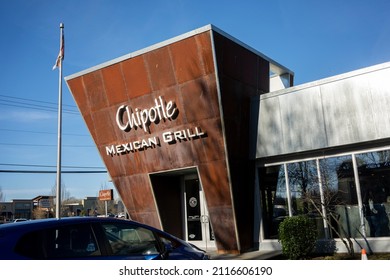 Beaverton, OR, USA - Jan 25, 2022: The industrial-style facade of a Chipotle Mexican Grill restaurant in Beaverton, Oregon. Chipotle is an American chain of fast casual restaurants.