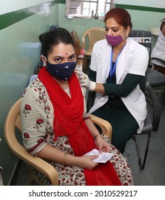 Beawar, Rajasthan, India, July 17, 2021: Indian Health Worker Administer First Dose Of COVID Vaccine To A Pregnant Woman During COVID-19 Vaccination Drive At A Government Hospital In Beawar.