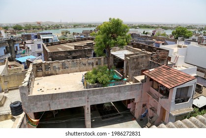 Beawar, Rajasthan, June 5,2021: 130-year-old Neem Tree Came Out Of Terrace, Passes Through Middle Of A Three-storey House In Beawar. A Unique Example Of Environmental Protection. Photo: Sumit Saraswat