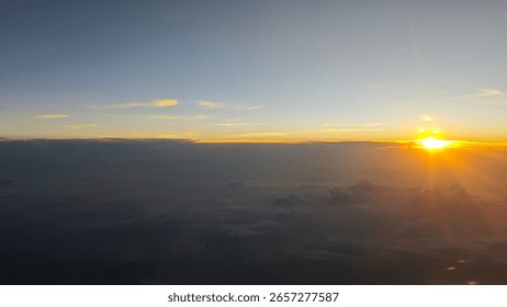 beaytiful sunset over the clouds