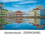 Beberibe River in Recife – Pernambuco – Brazil with its banks adorned by colorful houses, reflecting their vibrant colors in the water. Colorful houses