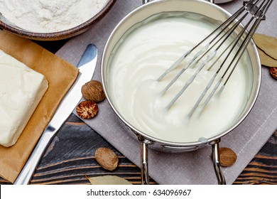 Bechamel Sauce In A Pan And Ingredients