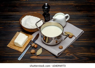 Bechamel Sauce In A Pan And Ingredients