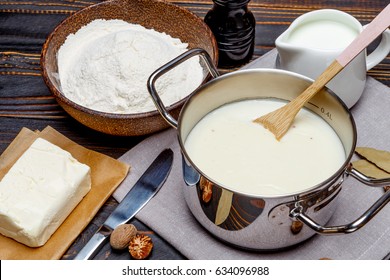 Bechamel Sauce In A Pan And Ingredients